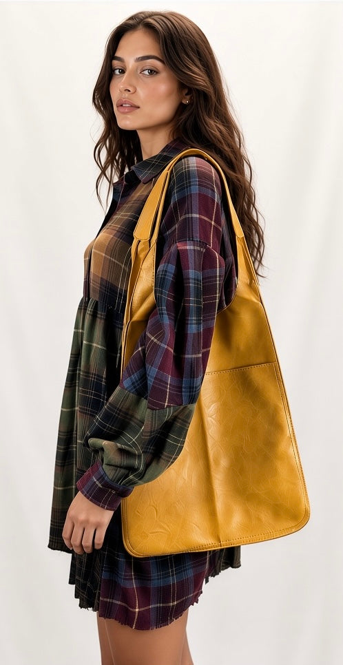 Mixed checkered woven babydoll top by Fantastic Fawn, featuring a loose fit and stylish pattern, worn as a casual or dressy top.