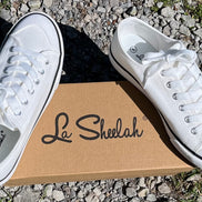 FASHION EMPORIO classic sneakers with white laces and rubber soles, featuring a stylish casual design.