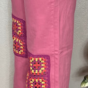 Judy Blue wide leg jeans with crocheted patch details and relaxed fit, full-length view showcasing trendy denim style.