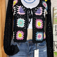 ADORA LA front tie crocheted cardigan shown in a full-length view with intricate crochet pattern and tie-front design.
