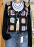 ADORA LA front tie crocheted cardigan shown in a full-length view with intricate crochet pattern and tie-front design.