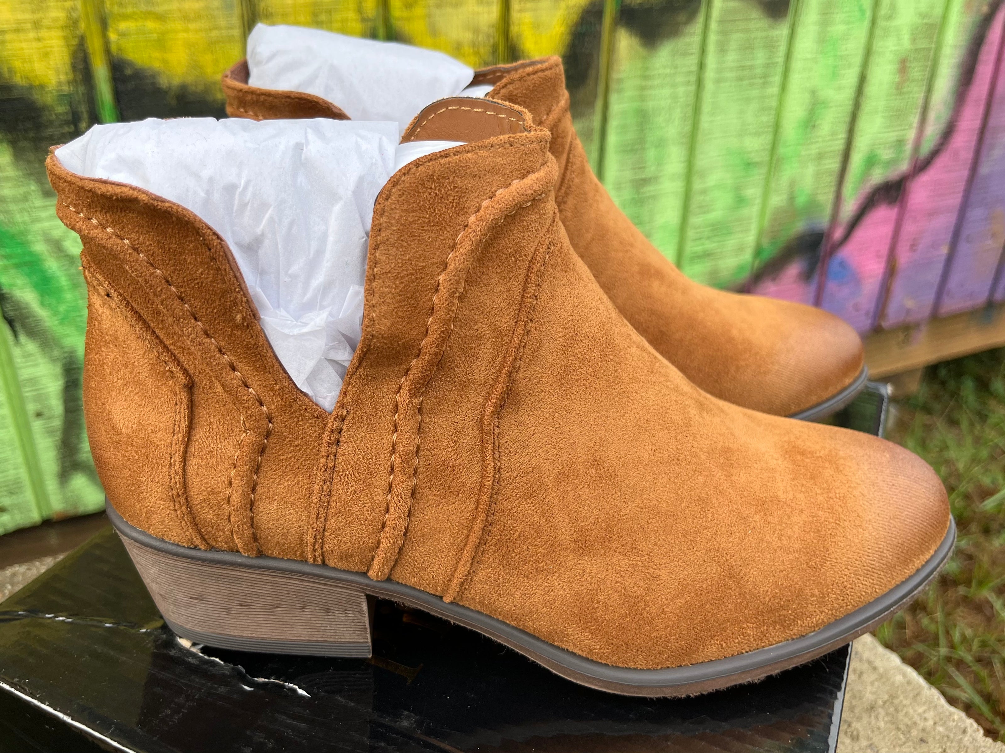 Pierre Dumas ankle boots with stylish leather design, featuring a sleek silhouette and sturdy heel for versatile wear.