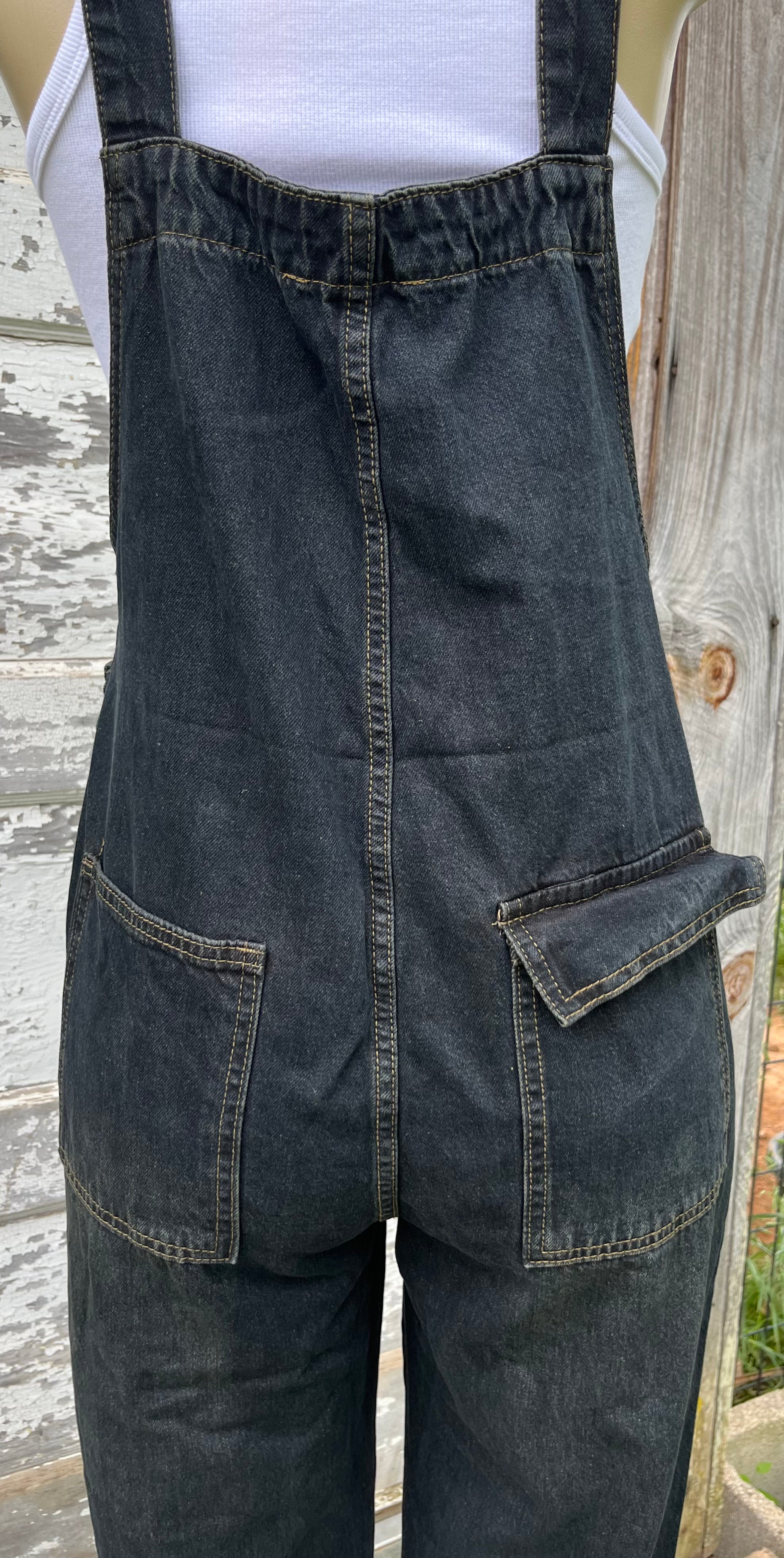 ADORA LA washed denim casual overalls displayed full-length, showing classic design with adjustable straps and front pockets.