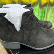 Pierre Dumas ankle boots with stylish leather design and low heel, displayed on a neutral background.