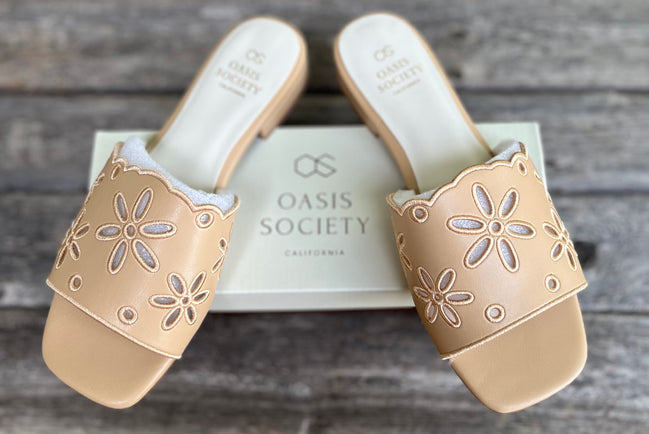 Oasis Society apricot flower cutout sandals with open toe and ankle strap on a neutral background.