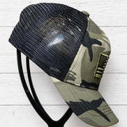 Unishe trucker hat featuring a mesh back and curved brim, casual accessories for sun protection and style.