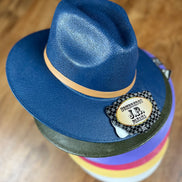 Colorful summer hat by Doña Cata Art featuring wide brim and lightweight fabric, perfect for sunny outdoor wear.