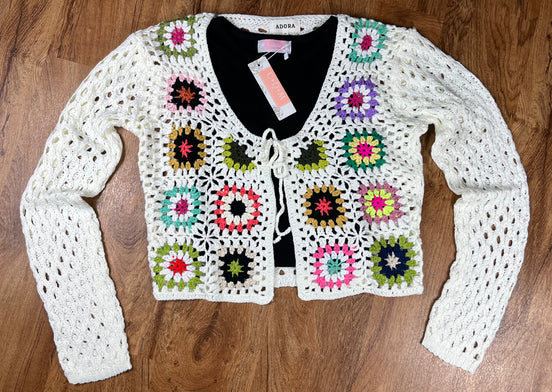 ADORA LA front tie crocheted cardigan showing intricate knit pattern and tie closure, perfect for a stylish layered look.