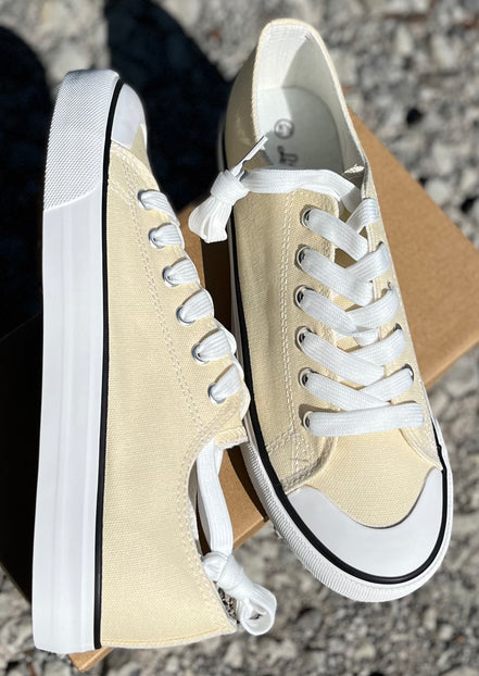 Classic FASHION EMPORIO sneakers with white laces and rubber soles, displayed on a neutral background.