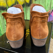 Pierre Dumas ankle boots featuring sleek leather design and low heel, perfect for stylish casual or dressy outfits.