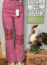 Judy Blue wide-leg jeans with crocheted patch details and a relaxed fit, showcasing the stylish denim design.