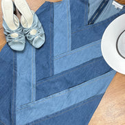 Color block denim dress by ADORA LA, featuring a stylish design with contrasting fabric panels and a fitted silhouette.