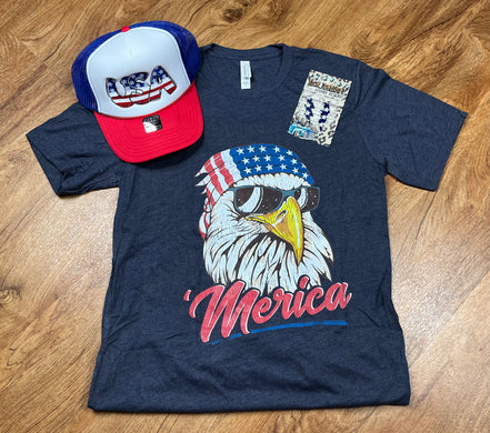 Front view of a patriotic T-shirt by Southern Attitude Designs Inc, featuring red, white, and blue American flag-inspired graphics.