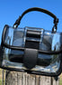 Miss Sparkling translucent buckle purse showing clear plastic material and silver buckle detail on a plain background.