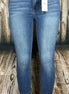 Full-length image of Judy Blue Classic Skinny jeans showing the fit and dark wash denim style.