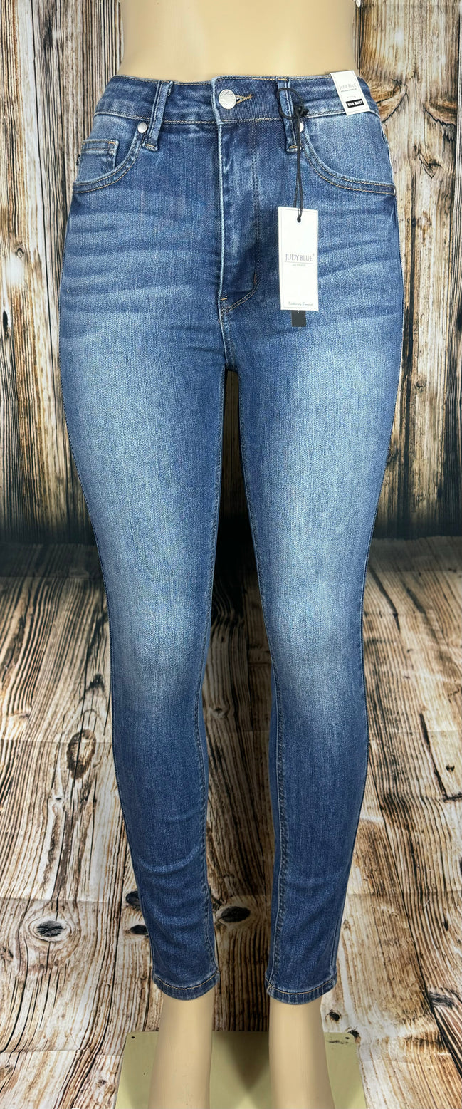 Full-length image of Judy Blue Classic Skinny jeans showing the fit and dark wash denim style.