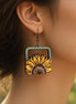 Hand-painted maple wood sunflower earrings by Seasideblooms featuring boho style and vibrant floral design.