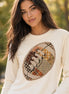 Patch football graphic tee top by Southern Attitude Designs Inc featuring a colorful football patch design on soft fabric.