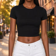 Popular 21 crew neck short sleeve cotton crop top, stylish and comfortable top with a classic design, shown on a model.