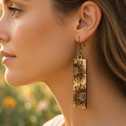Seaside Blooms sunflower bar dangle jewelry featuring yellow sunflower designs on silver hooks, stylish and vibrant.