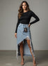 Distressed denim maxi skirt by Insane Gene USA featuring a high-waisted design and frayed hem, displayed on a hanger.