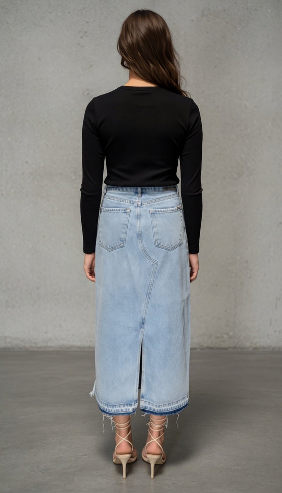Distressed denim maxi skirt from Insane Gene USA featuring a casual, ripped design and a flowing silhouette.