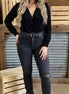 Black skinny jeans by VERVET by FLYING MONKEY with a close-up of the denim fabric and front pockets.