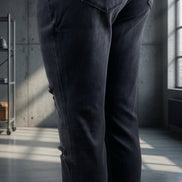 Black skinny jeans by VERVET by FLYING MONKEY, shown folded with waistband and slim fit design visible.