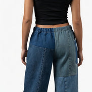 Pair of American Recycled Clothing denim eco jeans featuring a classic fit and five-pocket design on a neutral background.