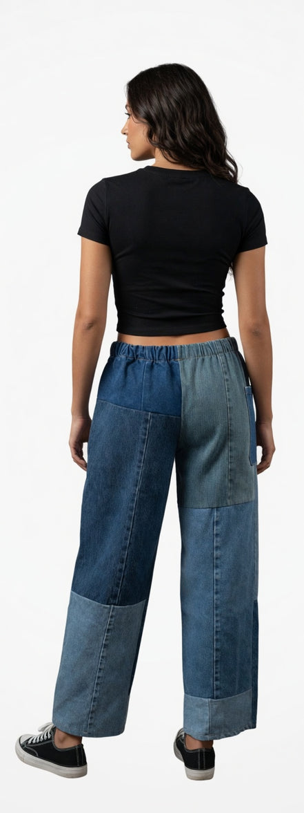Pair of American Recycled Clothing denim eco jeans featuring a classic fit and five-pocket design on a neutral background.