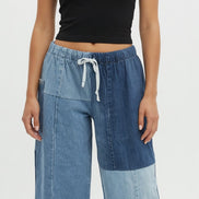 American Recycled Clothing denim eco jeans, casual fit with classic five-pocket design, showing the front view of the jeans.
