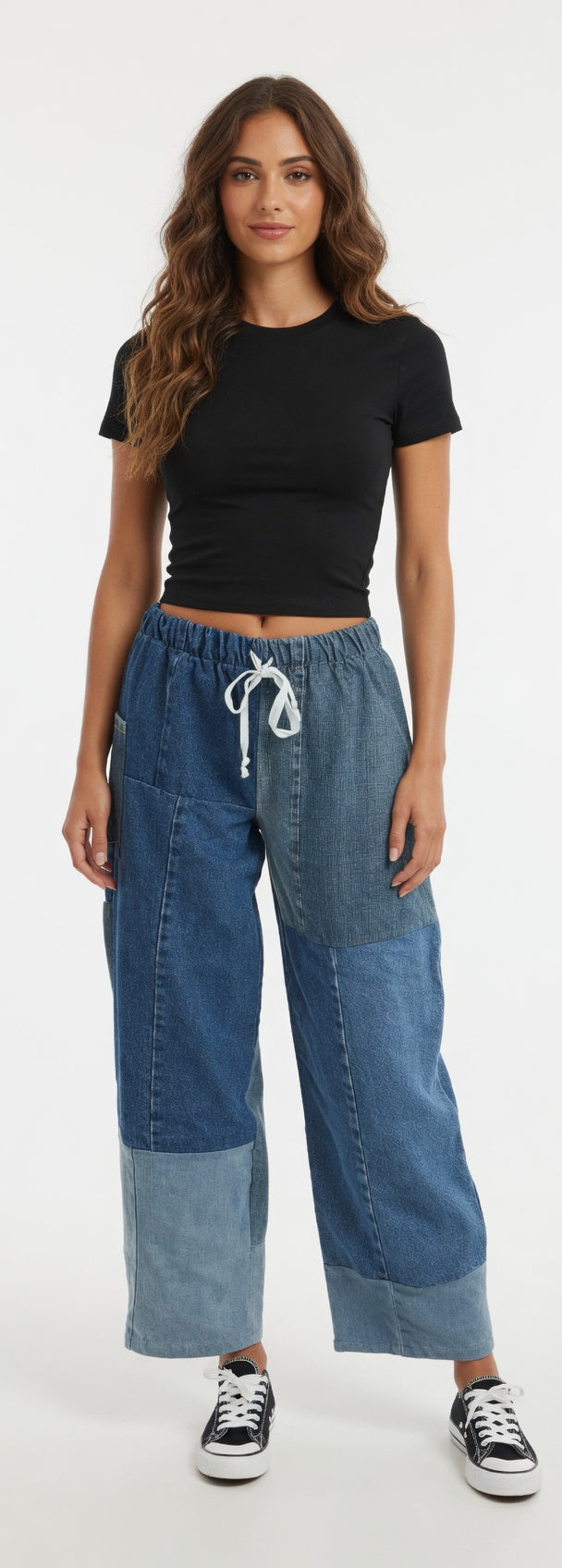 Blue denim eco jeans by American Recycled Clothing, showing the relaxed fit and classic five-pocket design.