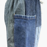 Pair of American Recycled Clothing denim eco jeans showing classic five-pocket style and straight-leg fit.