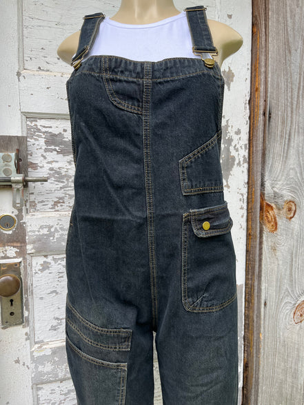 Light blue washed denim casual overalls by ADORA LA featuring adjustable straps and front pockets, displayed on a hanger.