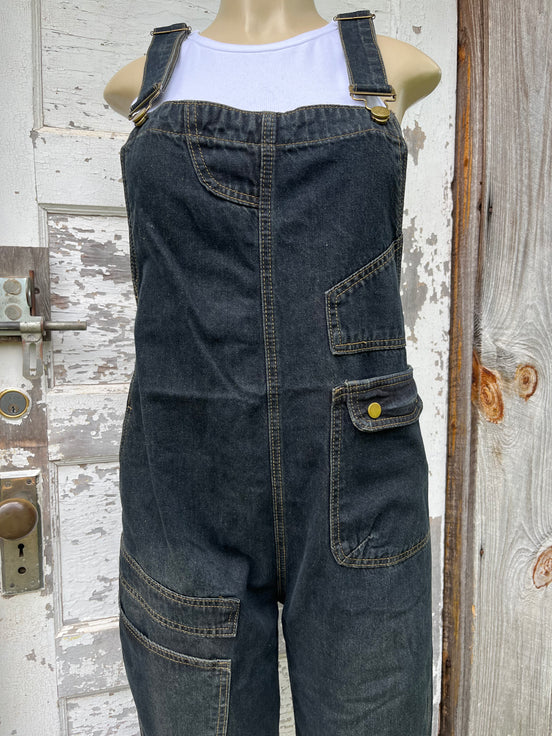 Light blue washed denim casual overalls by ADORA LA featuring adjustable straps and front pockets, displayed on a hanger.