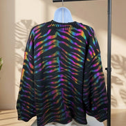 Suéter holográfico con estampado de cebra