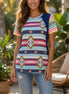 Dreamy Blue Aztec pattern blouse by Celeste Clothing, featuring vibrant geometric designs and flowing fabric.