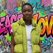 Miss Sparkling hooded cropped puffer vest outerwear, showcasing its quilted design and hood detail in a stylish close-up shot.