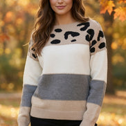 Leopard contrast color block Mazik sweater featuring mixed animal print and bold pattern in a cozy knit design.