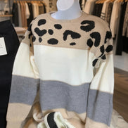 Mazik leopard contrast color block sweater showing a stylish knit with bold animal print and color blocking details.