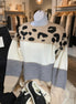 Mazik leopard contrast color block sweater showing a stylish knit with bold animal print and color blocking details.
