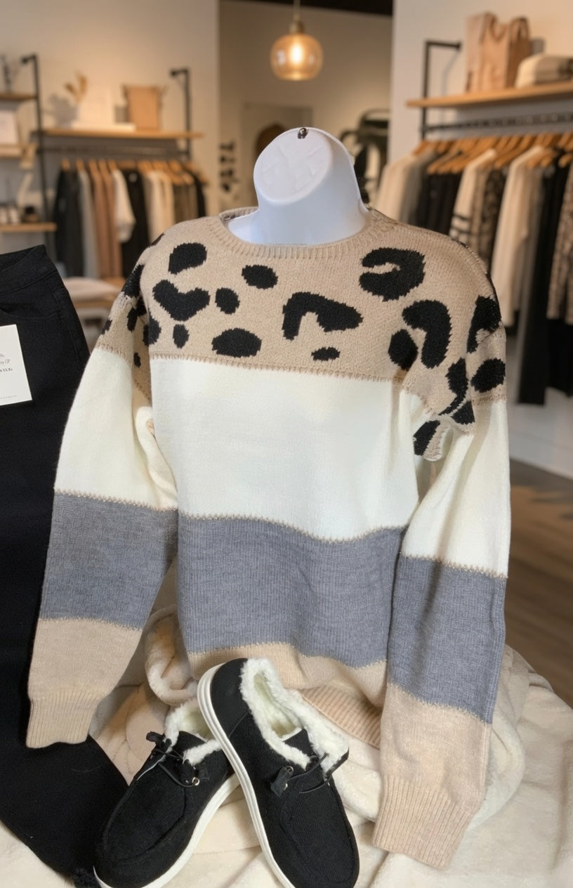 Mazik leopard contrast color block sweater showing a stylish knit with bold animal print and color blocking details.