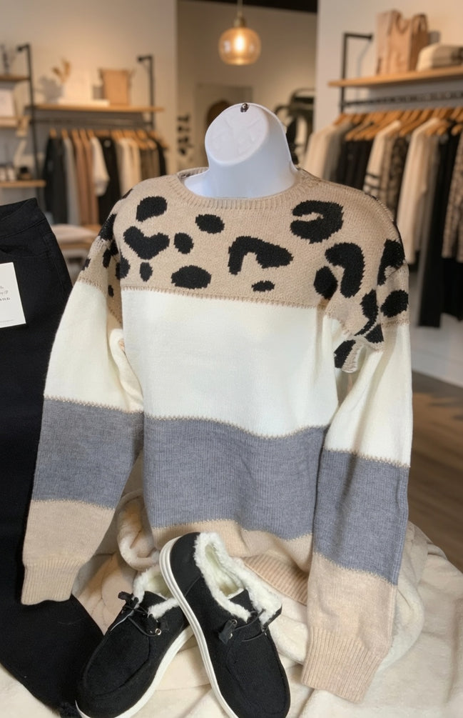 Mazik leopard contrast color block sweater showing a stylish knit with bold animal print and color blocking details.