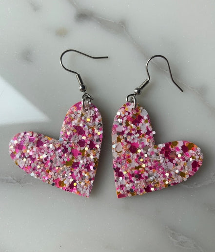 Pink glitter mix hearts by A Glamper’s Creations, LLC featuring sparkling pink heart-shaped confetti for craft or decoration use.