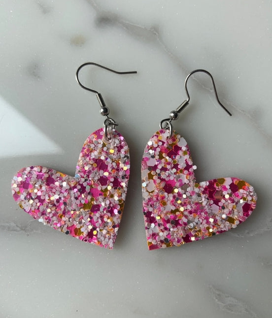 Pink glitter mix hearts by A Glamper’s Creations, LLC featuring sparkling pink heart-shaped confetti for craft or decoration use.