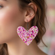 Pink glitter mix hearts by A Glamper’s Creations, LLC, featuring sparkling, colorful heart-shaped confetti for crafts and decorations.