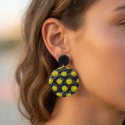 Avenue Zoe Happy Face Dangles earrings featuring cheerful smiley face charms hanging from silver hooks.