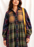 Mixed checkered woven babydoll top by Fantastic Fawn featuring a loose fit and stylish design, displayed on a hanger.
