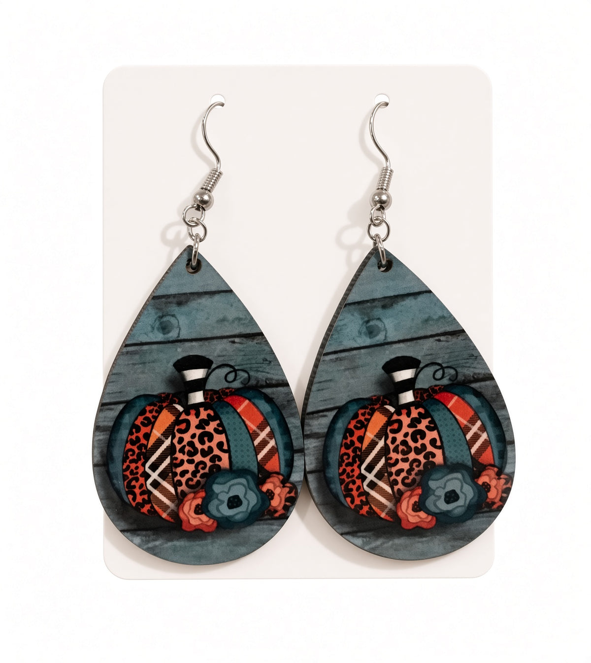 Colorful patterned pumpkin earrings by Earring Babe Boutique, featuring vibrant fall-inspired jewelry design.