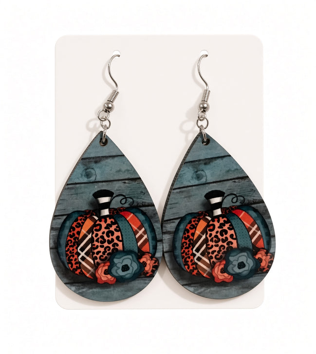 Colorful patterned pumpkin earrings by Earring Babe Boutique, featuring vibrant fall-inspired jewelry design.